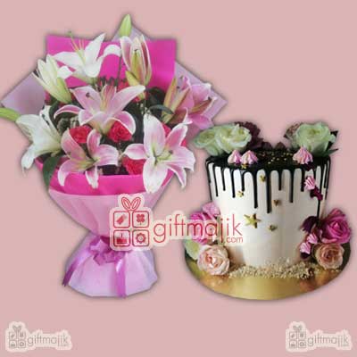 assorted flowers arrangement and flowers loaded cake