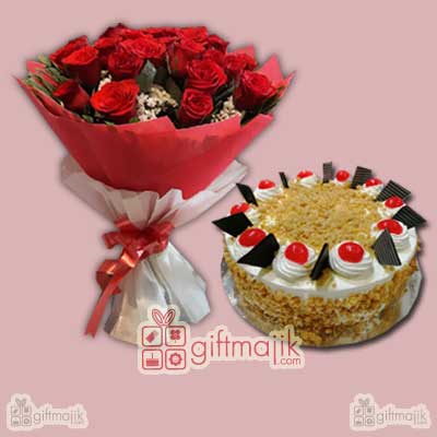 Butterscotch cake with beautiful red roses bunch